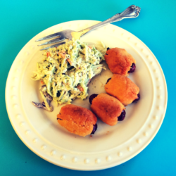 Cheddar pigs in blanket with broccoli slaw